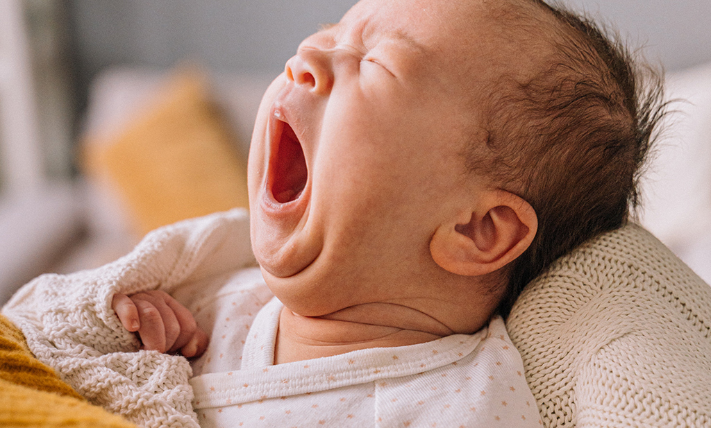 a newborn's yawning