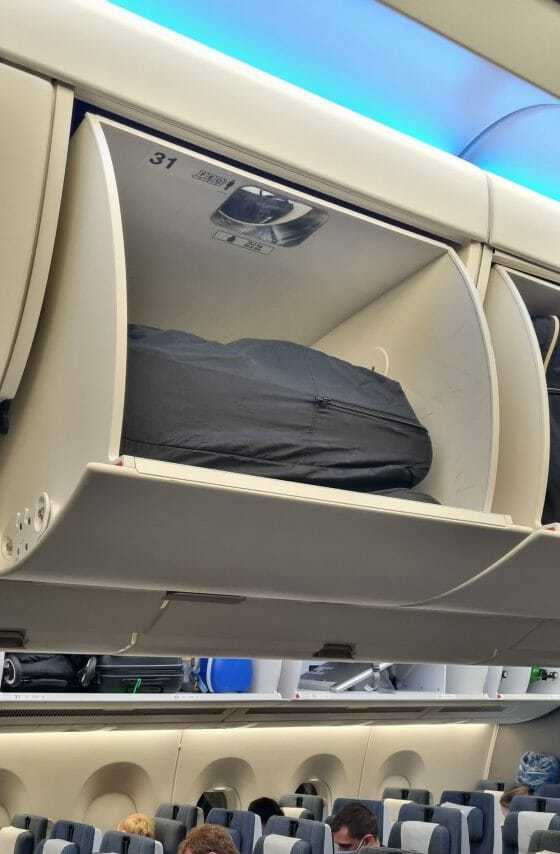 Stroller fits in the plane cabinet