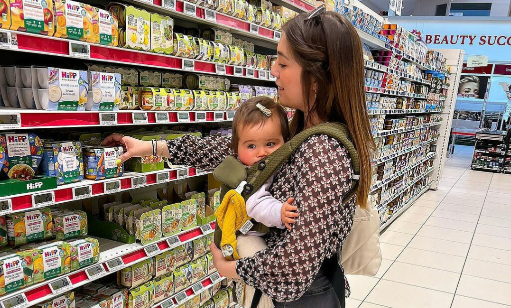Shopping with baby in a baby carrier