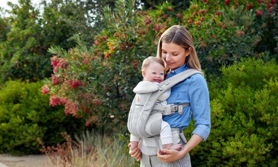 Woman carries a baby with Down Syndrome