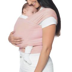 Mum wearing baby inward facing in Aura Wrap Blush Pink Carrier