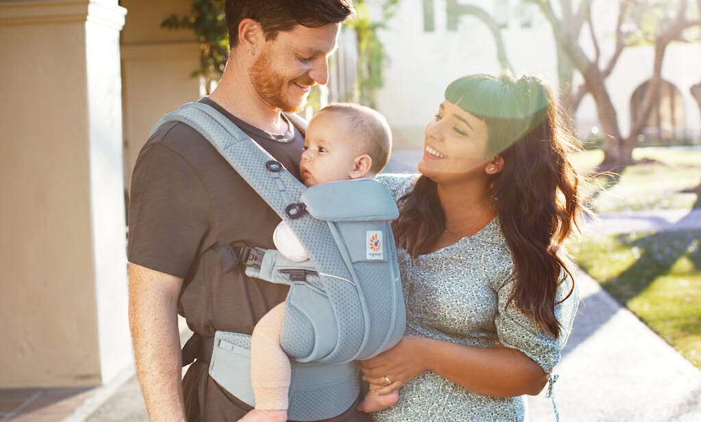 Dad wearing an Ergobaby Omni Breeze baby carrier in summer 