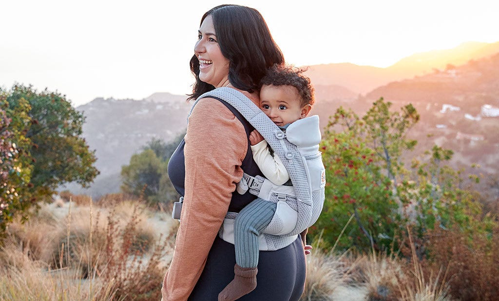 International Women's Day - Woman carryinng a baby