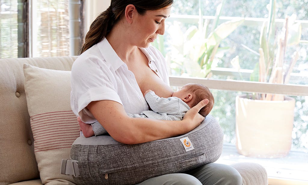 Breastfeeding with nursing pillow