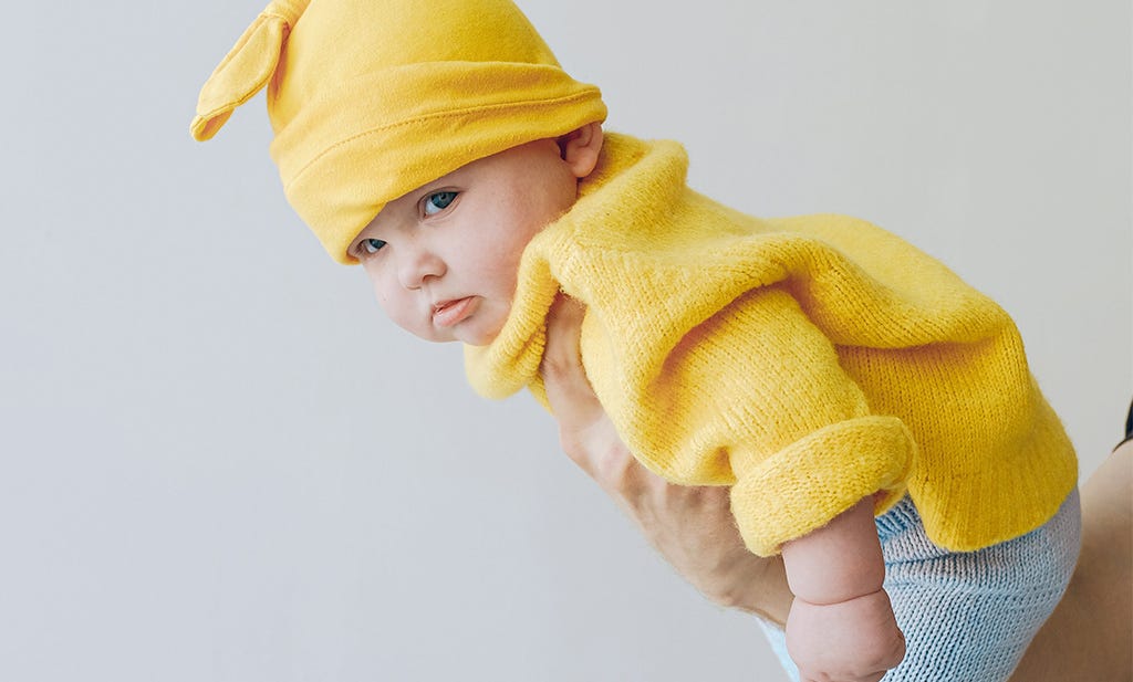 Handling your baby: how to change a nappy, lay baby down and pick them up correctly.